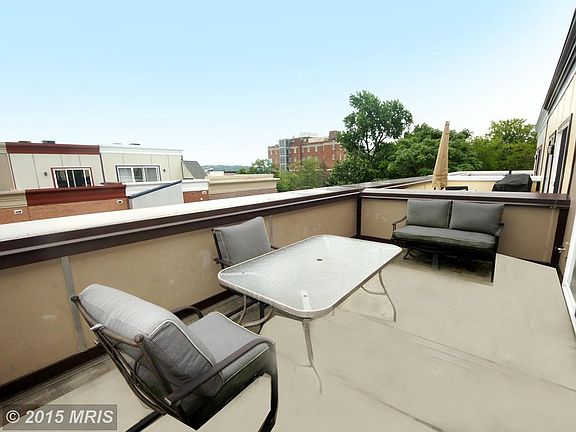 Rooftop Entertaining Terrace with Urban Skyline