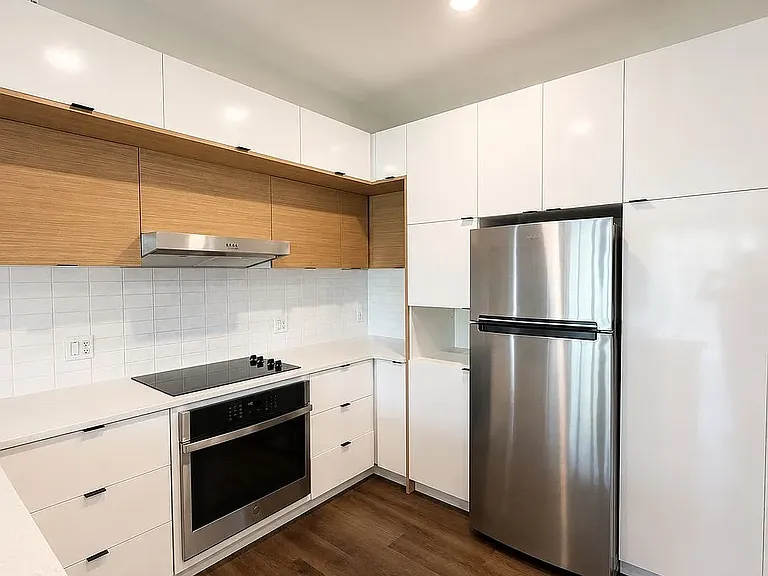 Kitchen with Stainless Steel Appliances and Quartz Countertops