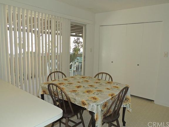 Dining room with sliding glass door.