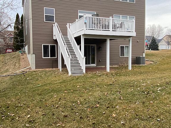 Rear of House. Maintenance free deck recently redone.