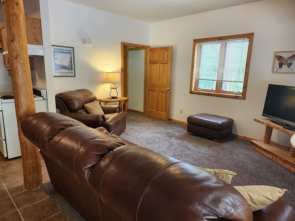 living room and storage closet