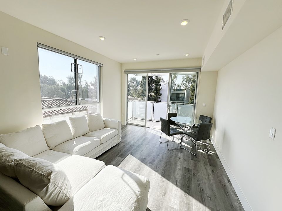 662 Kelton Avenue, #503, Westwood, CA 90024 - LIVING ROOM w/ Dining Table & Balcony