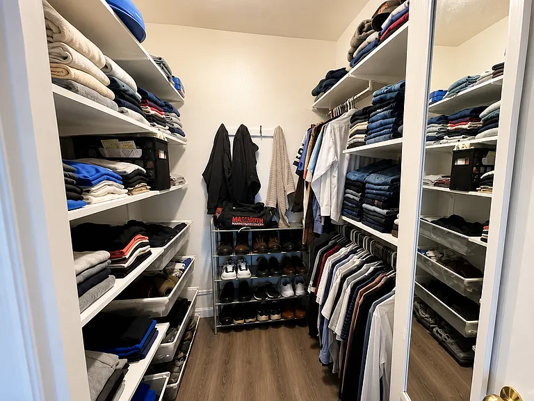 Primary closet, includes closet organizer.