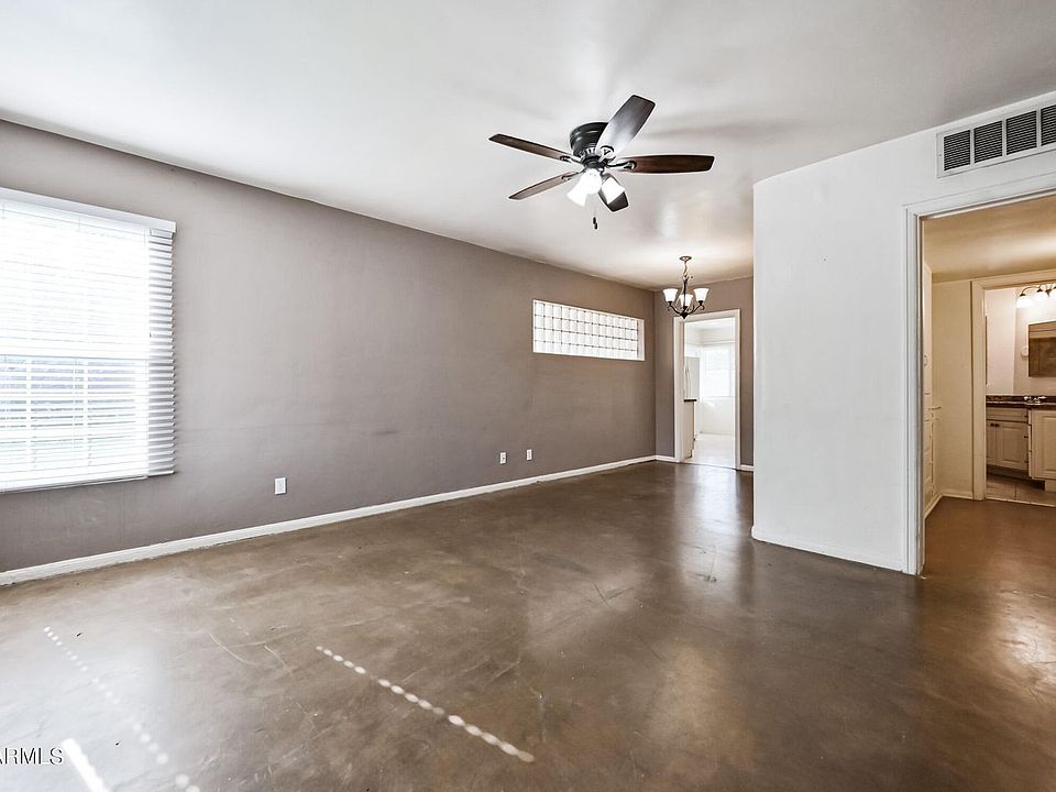 Stained cement floor throughout