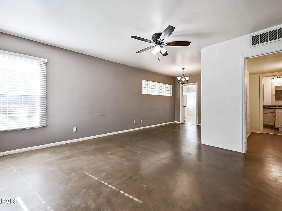 Stained cement floor throughout