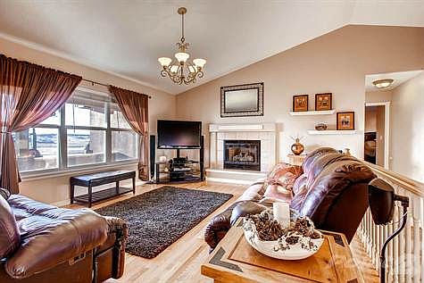 Great Room with Picture Window, Fireplace & Hardwood Floors