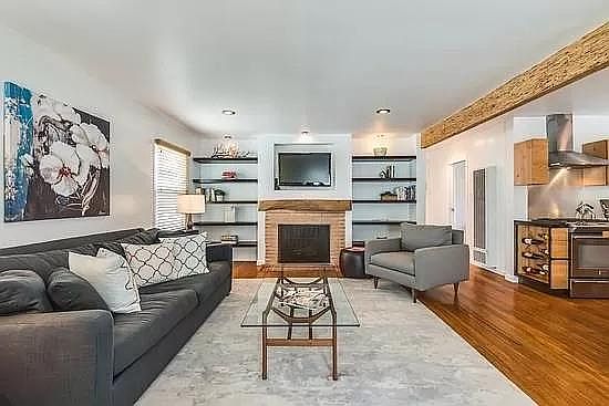 Living Room with wood burning fireplace