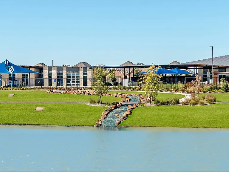 This is the backside of the community club-house. The pond is stocked with fish and available to community members.