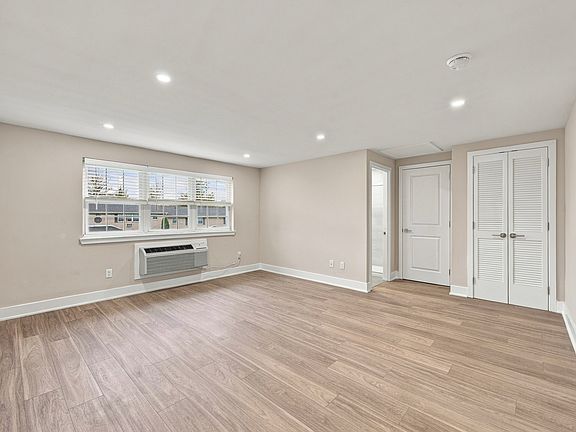 Large open floor plans with hardwood floor