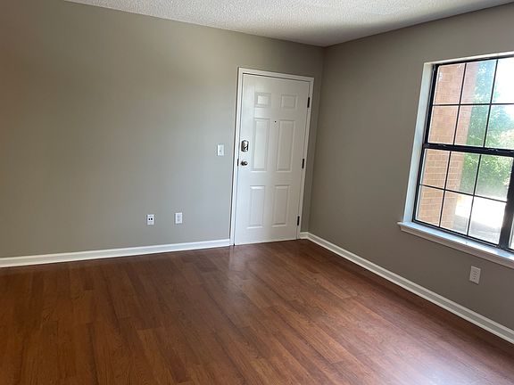 LVP floors, new paint, and lots of light in the open living room