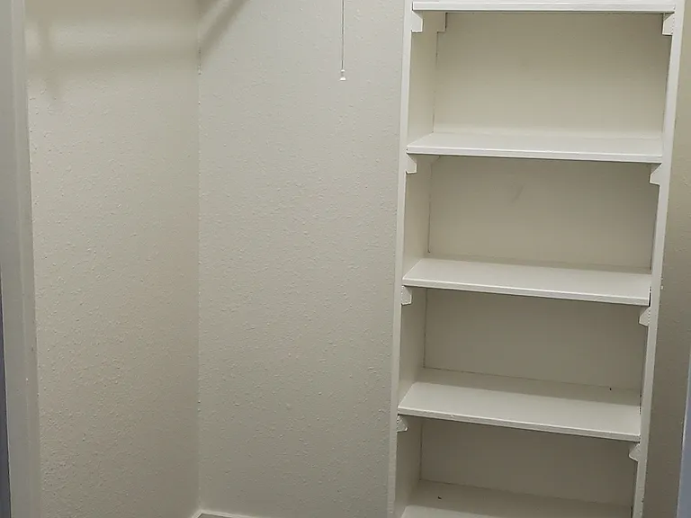 Master bedroom walk in closet.