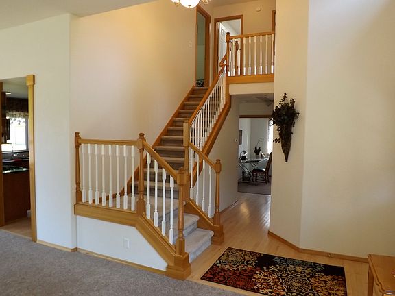 open-rail wood staircase