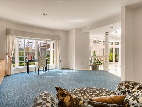 Roomy & cozy main floor library/den/music or sitting room ... or all the above!