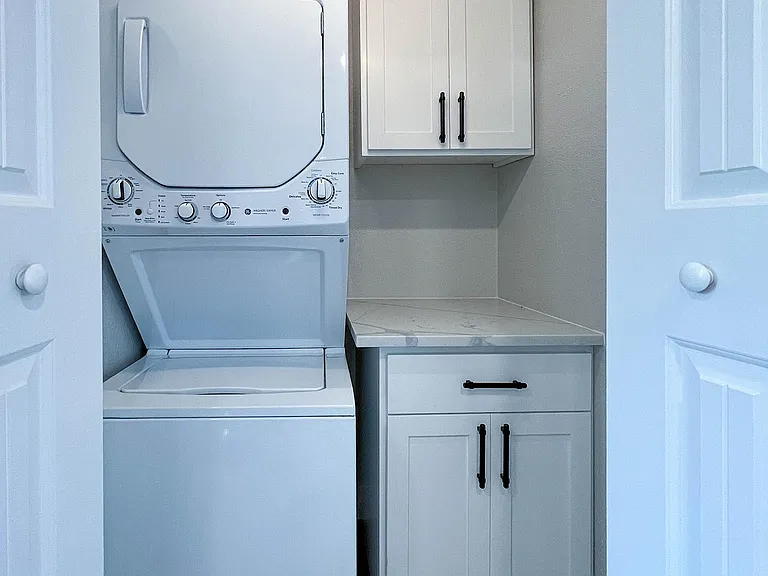 Washer & dryer with storage and quartz counter
