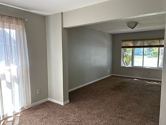 Living room and dining/office use area.