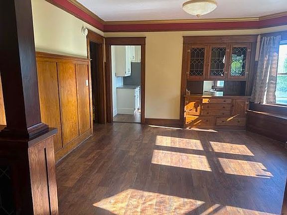 view of dining room and leaded glass builtins