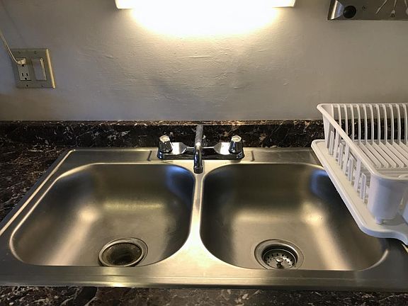 Sink with garbage disposal