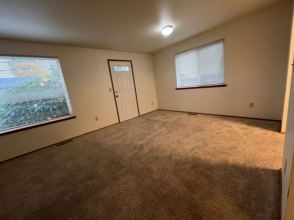 Living room. Door leads to the deck.