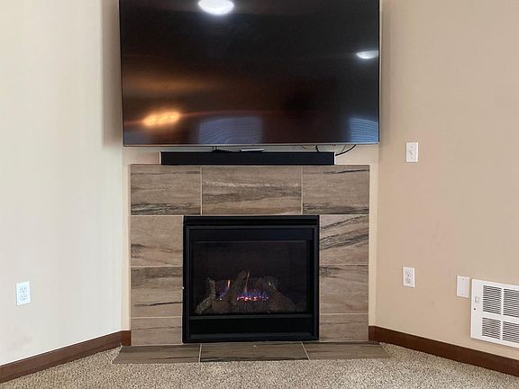 Gas fireplace gives you cozy feeling of home.