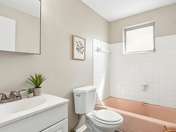 bathrooms include new fixtures, showers, toilets, and vanities