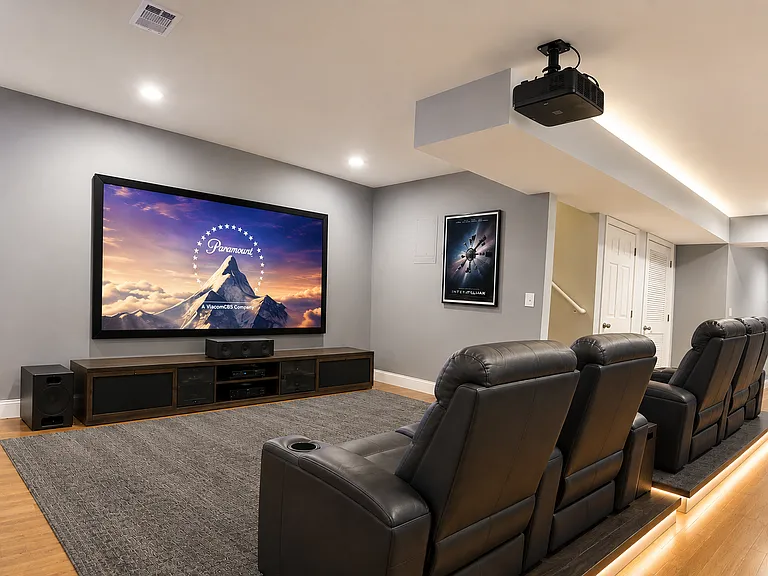 Expansive finished basement virtually staged as a modern home theater and entertainment lounge