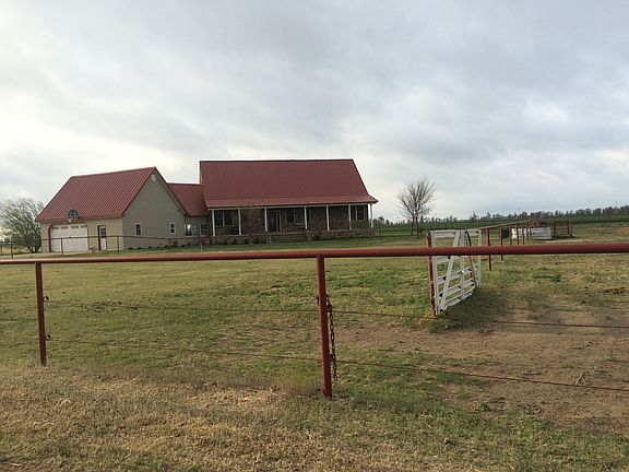 Front of house w corrals