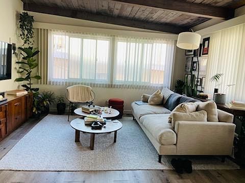 Archival photo of living room with current flooring.