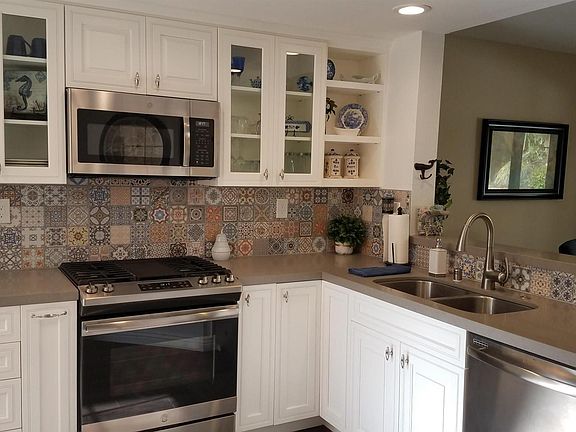 Kitchen with pass thru to dining area