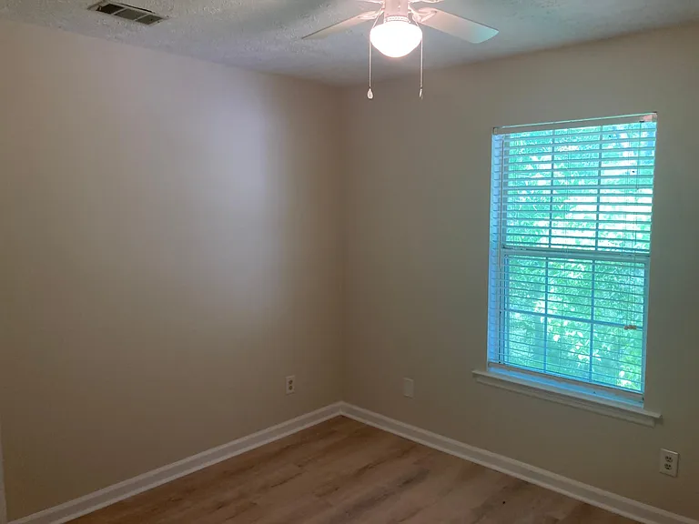 Bedroom 2 with natural / private views in the trees.