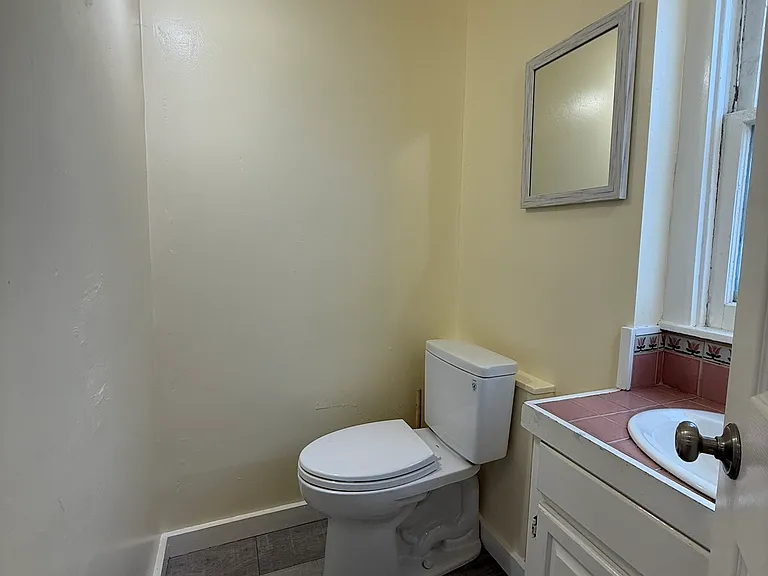 Half-bath off the laundry area