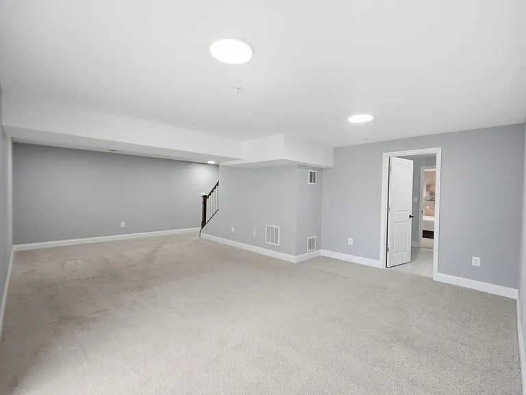 Massive basement with fifth bedroom and en-suite full bath, that can be used as an in-law suite, second living area, or kids play area.