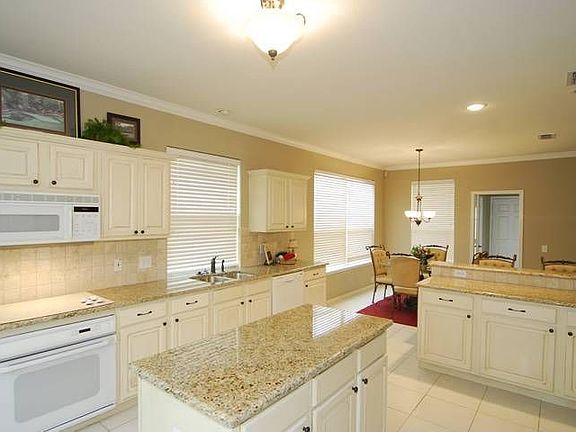 HUGE Gourmet kitchen and breakfast area with two islands and two walk in pantr