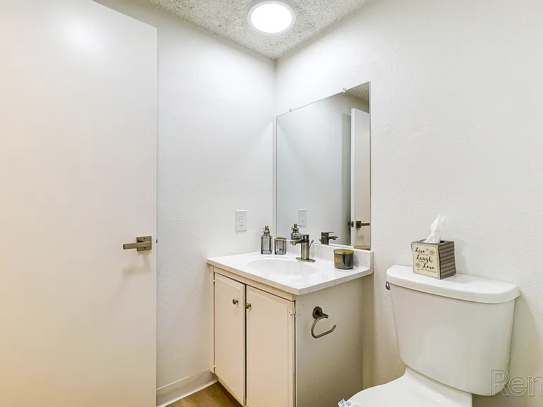 Experience the elegance of this modern bathroom, crafted for comfort and style.