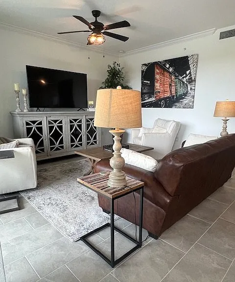 Living Room - 65" TV with multiple streaming apps and Spectrum cable