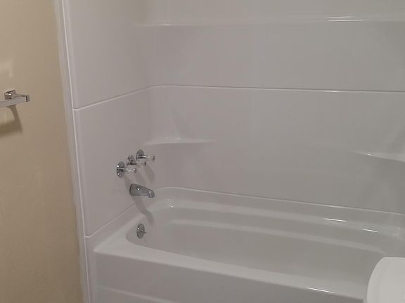 Full bathroom upstairs tub-shower (older photo with prior paint color)