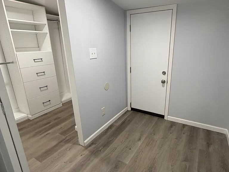 Egress to the backyard with entry to the walk-in closet