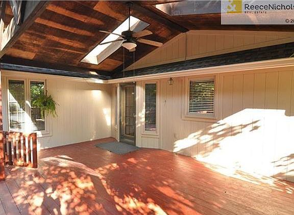 Entertaining-sized deck walks out from eat-in kitchen