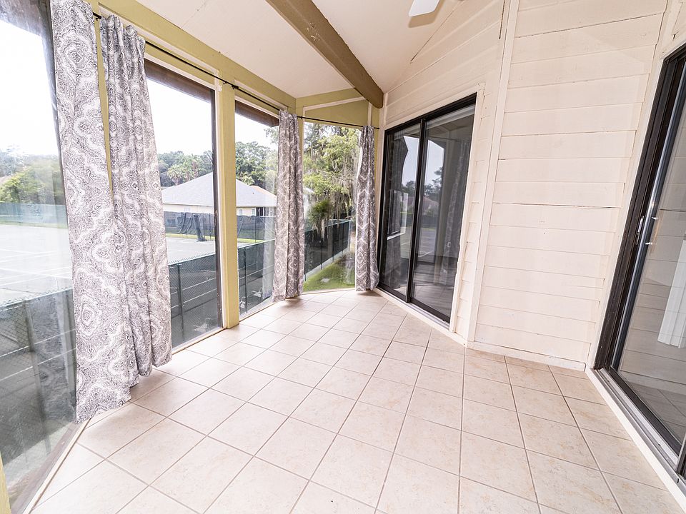 Sunroom, off master and living room