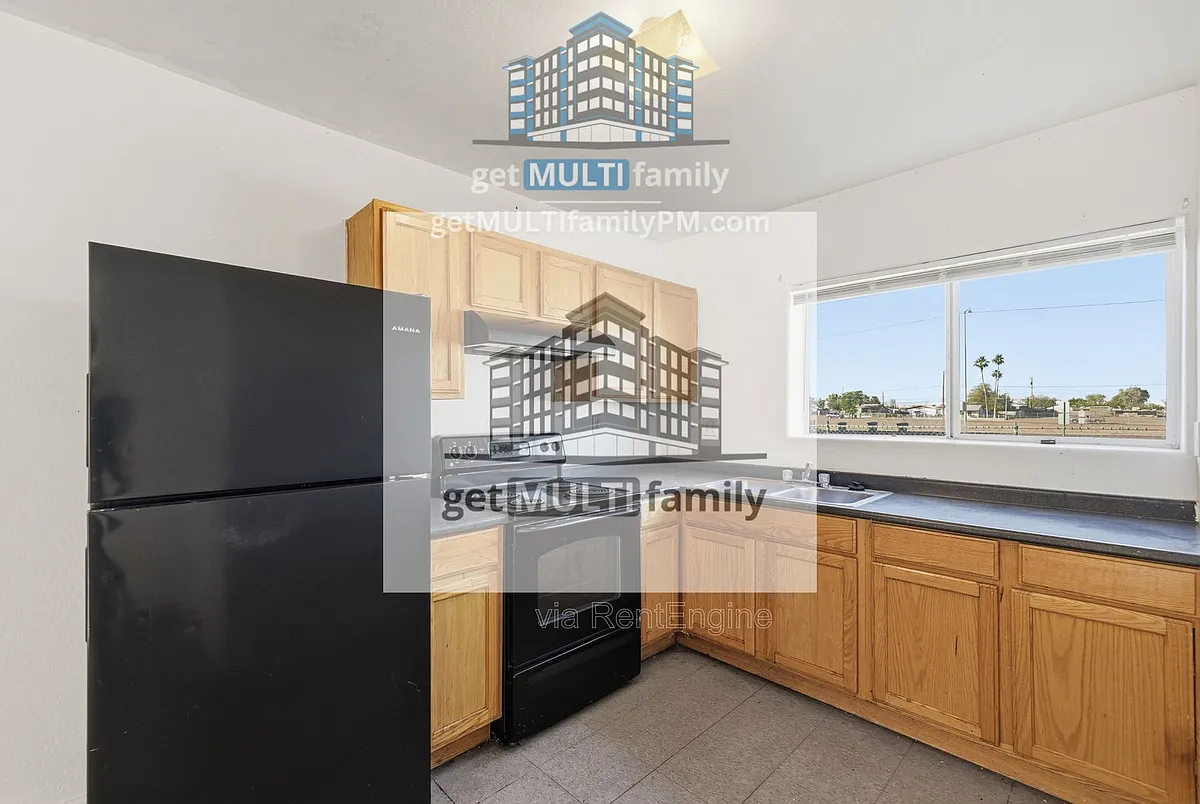 Building Photo - 1224 E Apache St #2