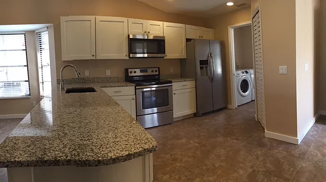 Kitchen & laundry room (with pocket door)