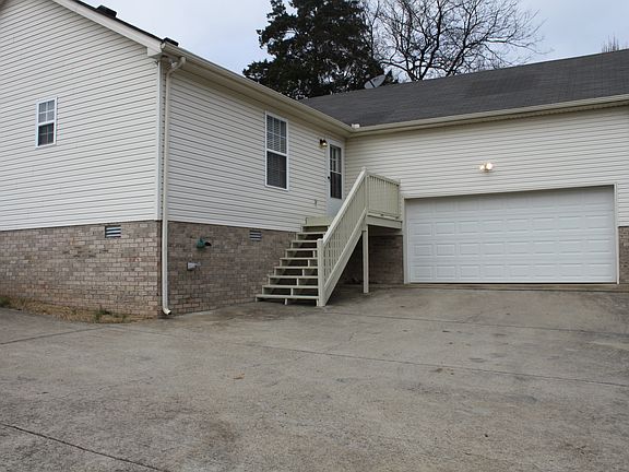 Notice 2 car attached garage & deck!