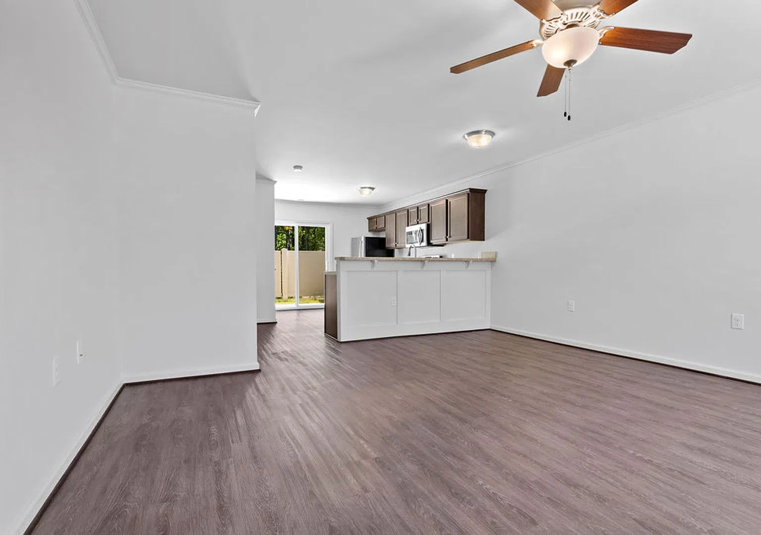 Stylish End Unit with Fenced Outdoor Space — Photo 2