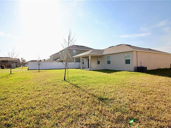 Back/Side View of House and Backyard