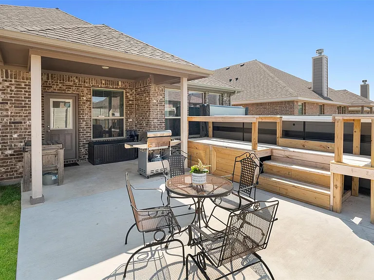 The photos were taken while the home was occupied. The furniture and swim spa shown in the photos is not included with the home.