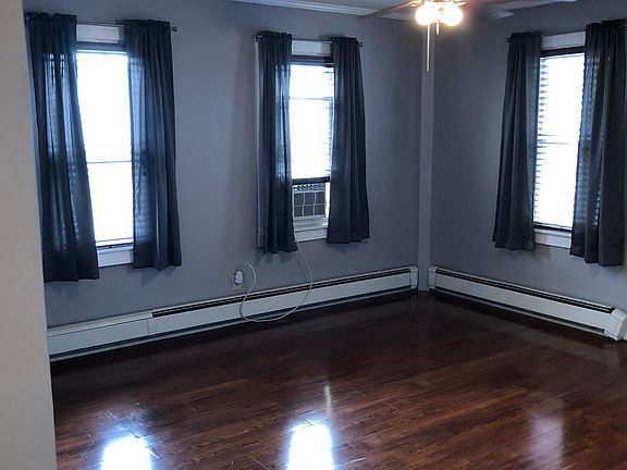 Living Room Brazilian hardwoods, ceiling fan, new light gray