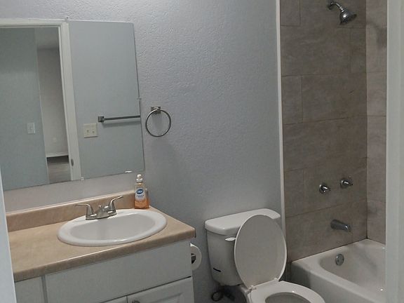 Full bath downstairs next to kitchen