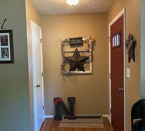 Front door and coat closet