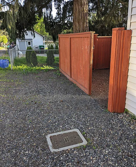 Alley parking and gated entry to property.