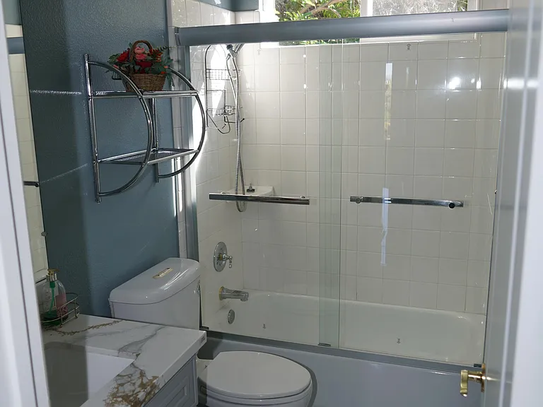 Bathroom with vanity shower and bathtub