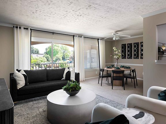 Open living room with bright windows